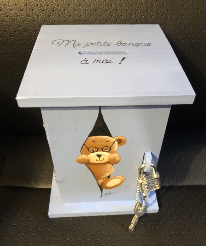 Tirelire nounours lunettes bleues